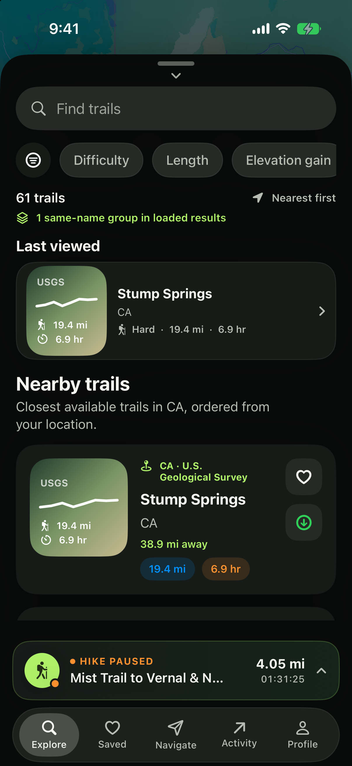 Hiking+ trail discovery screen with nearby routes, filters, and a paused hike